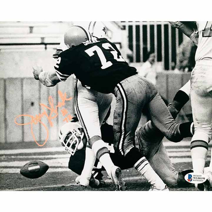 Jerry Sherk Cleveland Browns Signed 8x10 Photo tackling with Beckett Witnessed COA